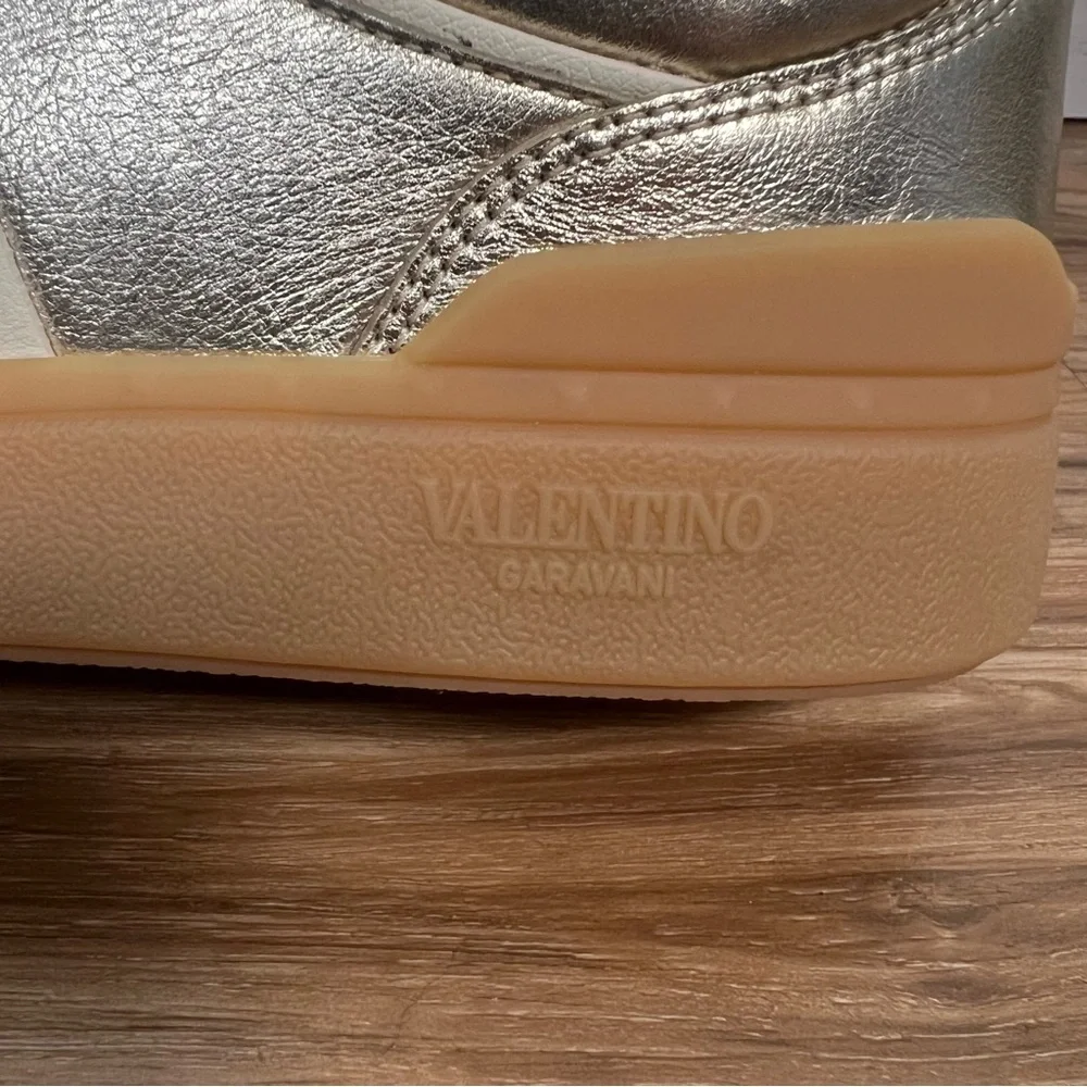 Valentino Garavani Women’s Upvillage Trainer Sneakers in Laminated Calfskin Gold